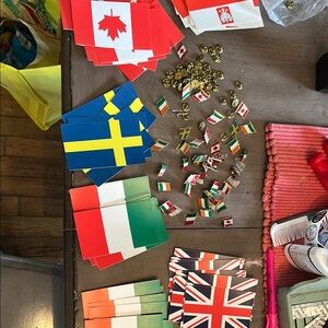International Flag Party pins and stickers